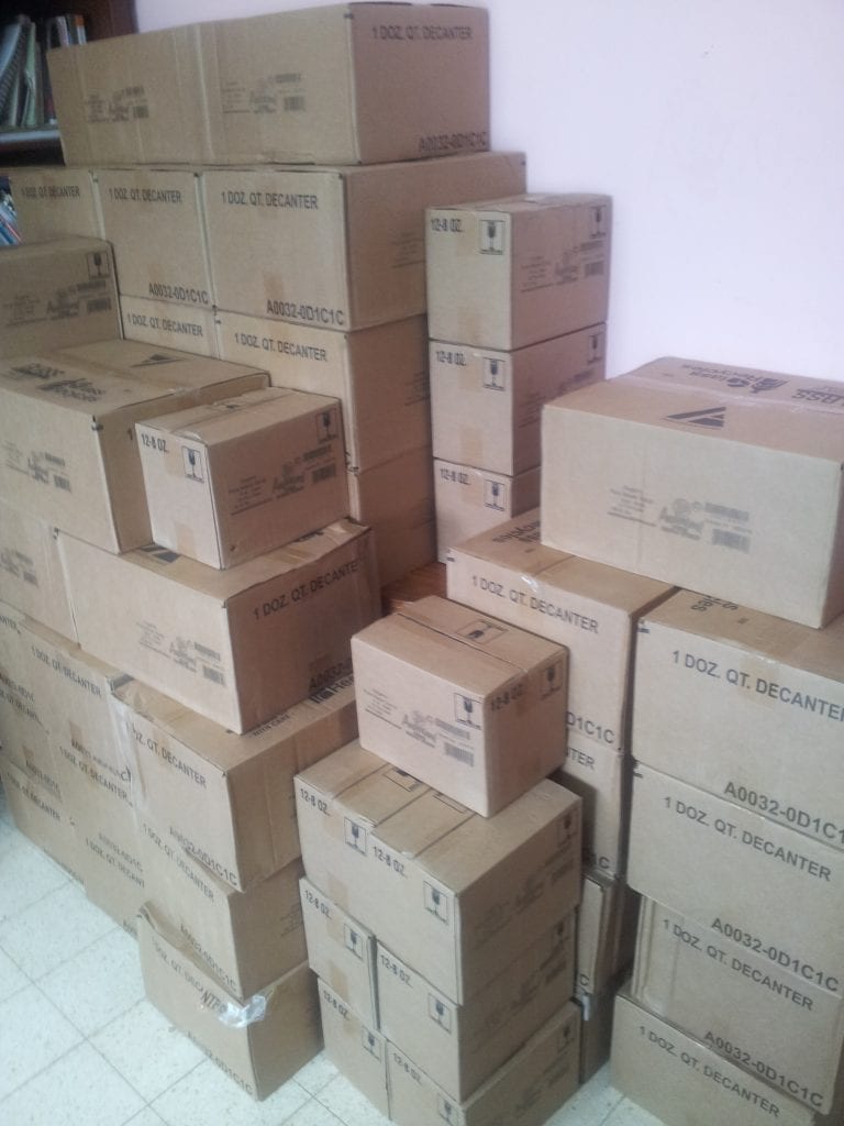 A large pile of boxes containing 1990 pounds of organic maple syrup in Israel